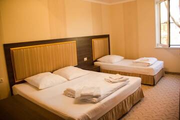 Фото номера Cемейный номер с собственной ванной комнатой Гостевой дом Valentina Guest House г. Цандрыпш 6