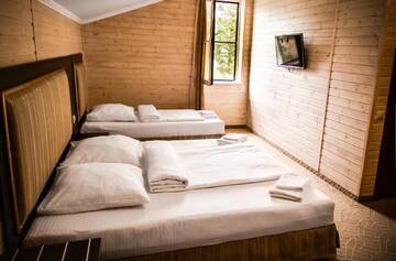 Фото номера Улучшенный семейный номер Гостевой дом Valentina Guest House г. Цандрыпш 8