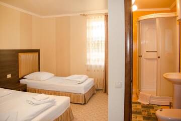 Фото номера Cемейный номер с собственной ванной комнатой Гостевой дом Valentina Guest House г. Цандрыпш 2