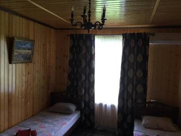 Фото номера Двухместный номер с 2 отдельными кроватями Гостевой дом Бархат г. Цандрыпш 2