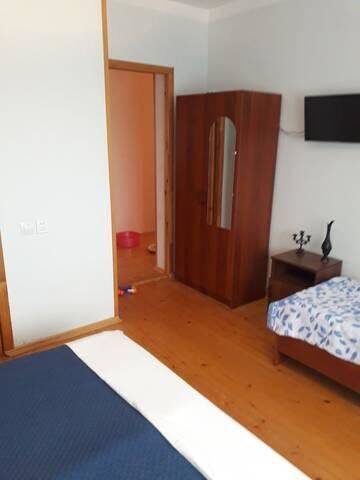 Фото номера Роскошный трехместный номер Гостевой дом Zhanna Guesthouse г. Цандрыпш 5